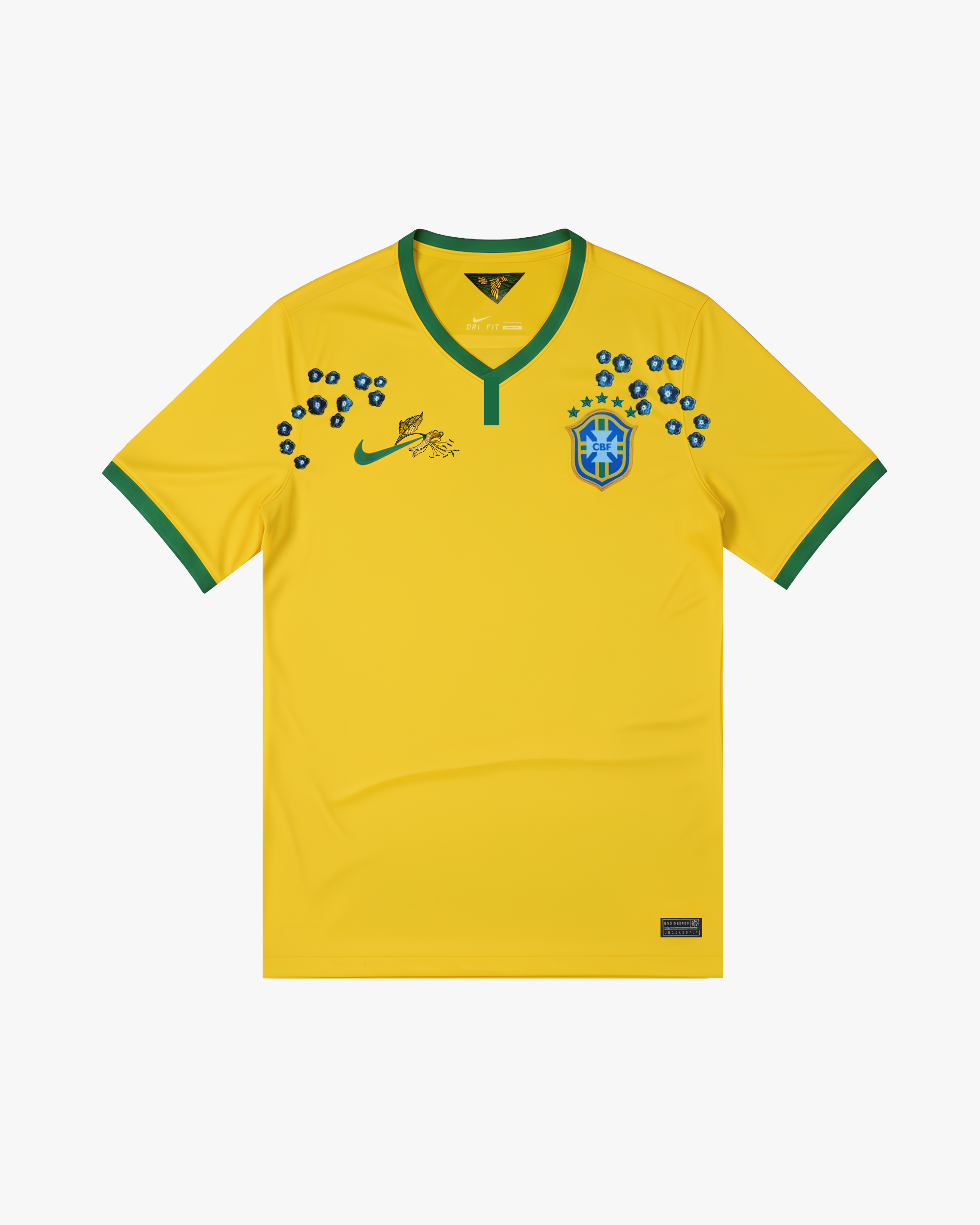 Official Embroidered Brazil Home Jersey 2014. Iconic yellow design featuring a green V-neck, blue floral embroidery around the crest, and a textured Nike swoosh.