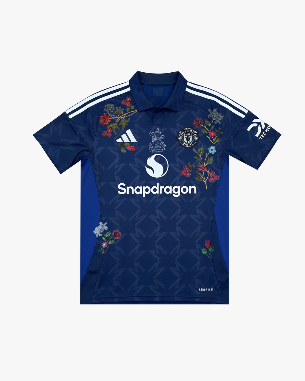 Embroidered Manchester United Away Jersey 2024-25 with floral embroidery on a deep navy base.