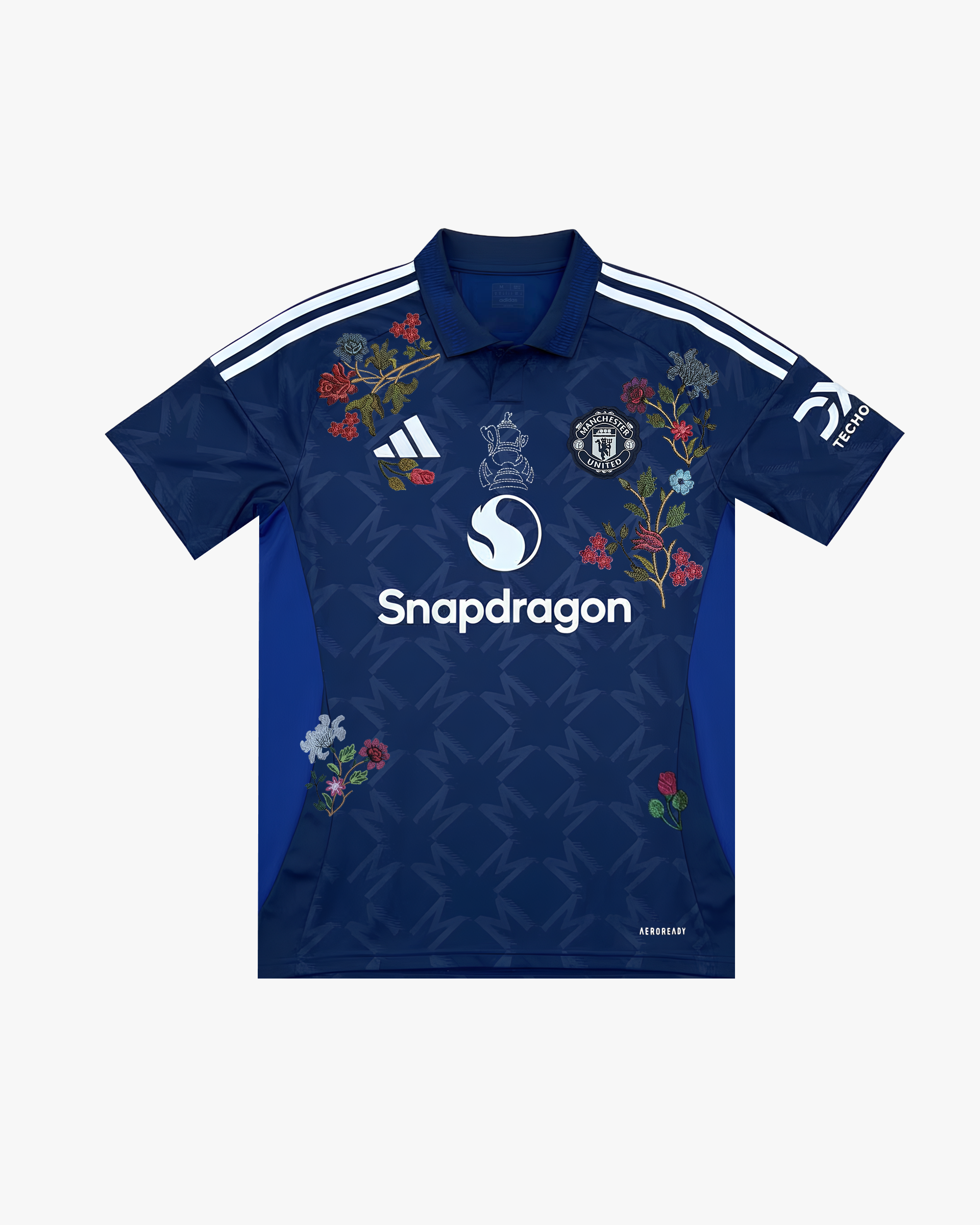 Embroidered Manchester United Away Jersey 2024-25 with floral embroidery on a deep navy base.