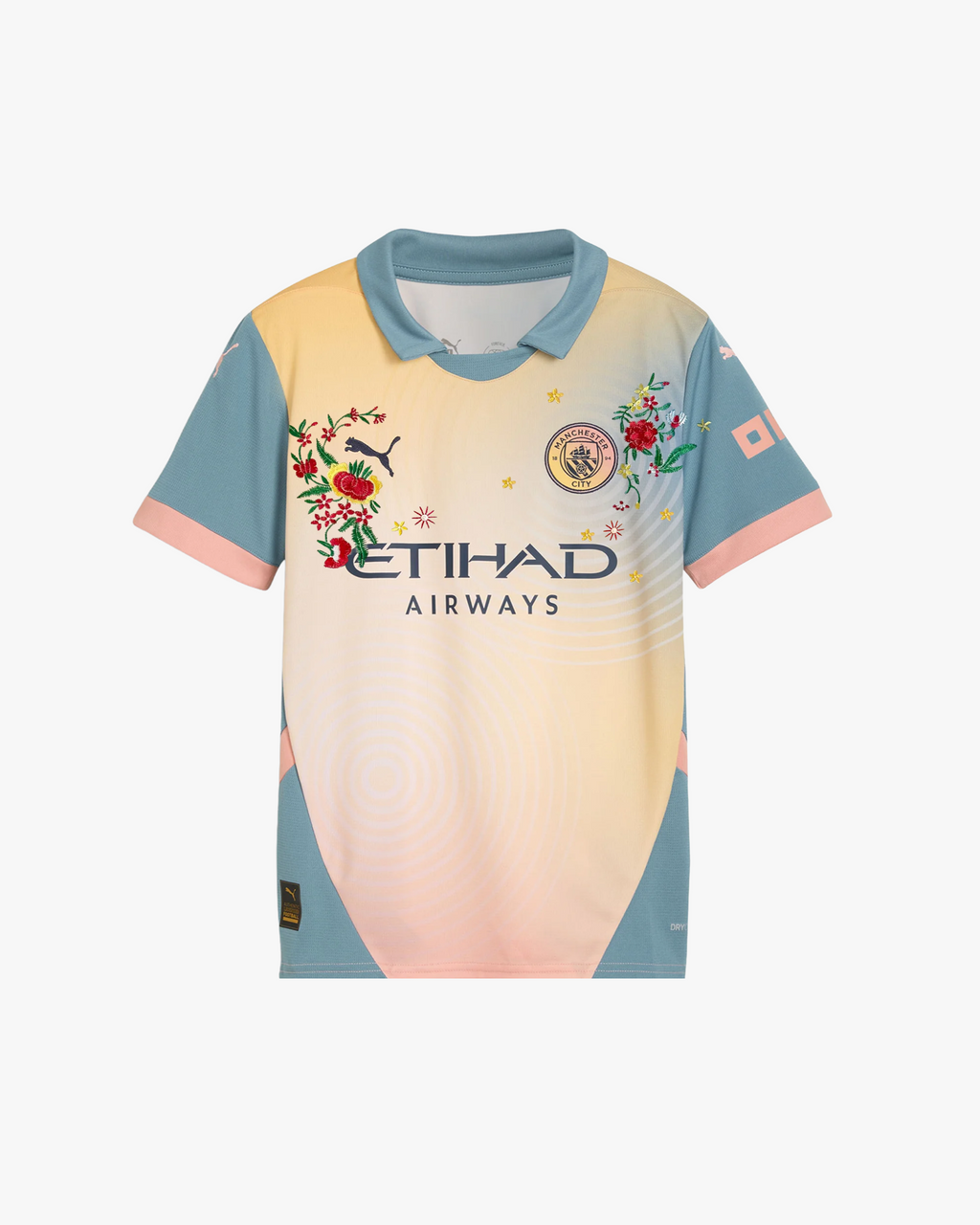 Full front view of the Embroidered Manchester City Fourth Jersey 2024-25 featuring a gradient yellow-to-blue design with vibrant floral embroidery and a classic polo collar.
