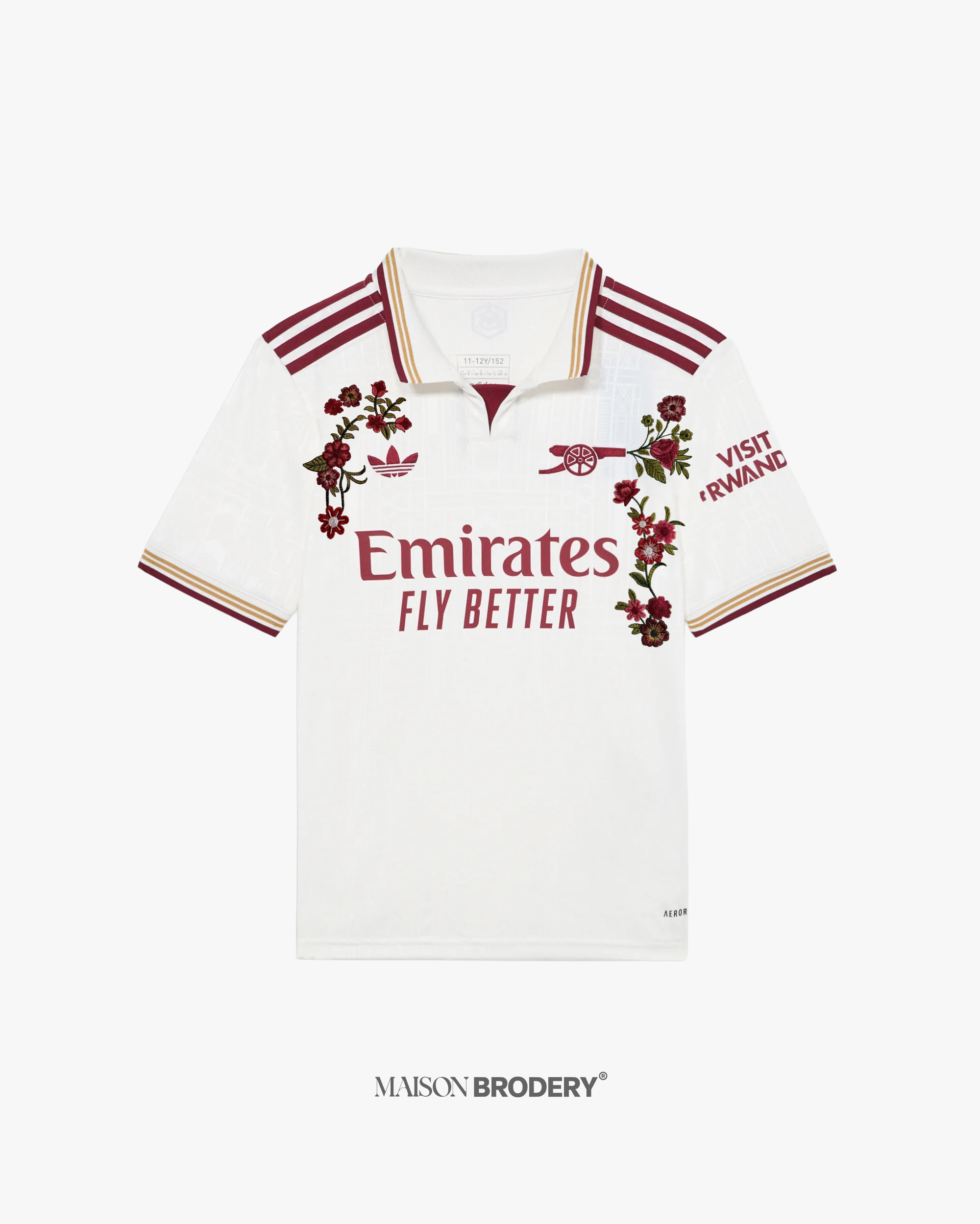 Embroidered Arsenal Third Jersey 2025-26 featuring floral designs and burgundy accents on a soft off-white background.