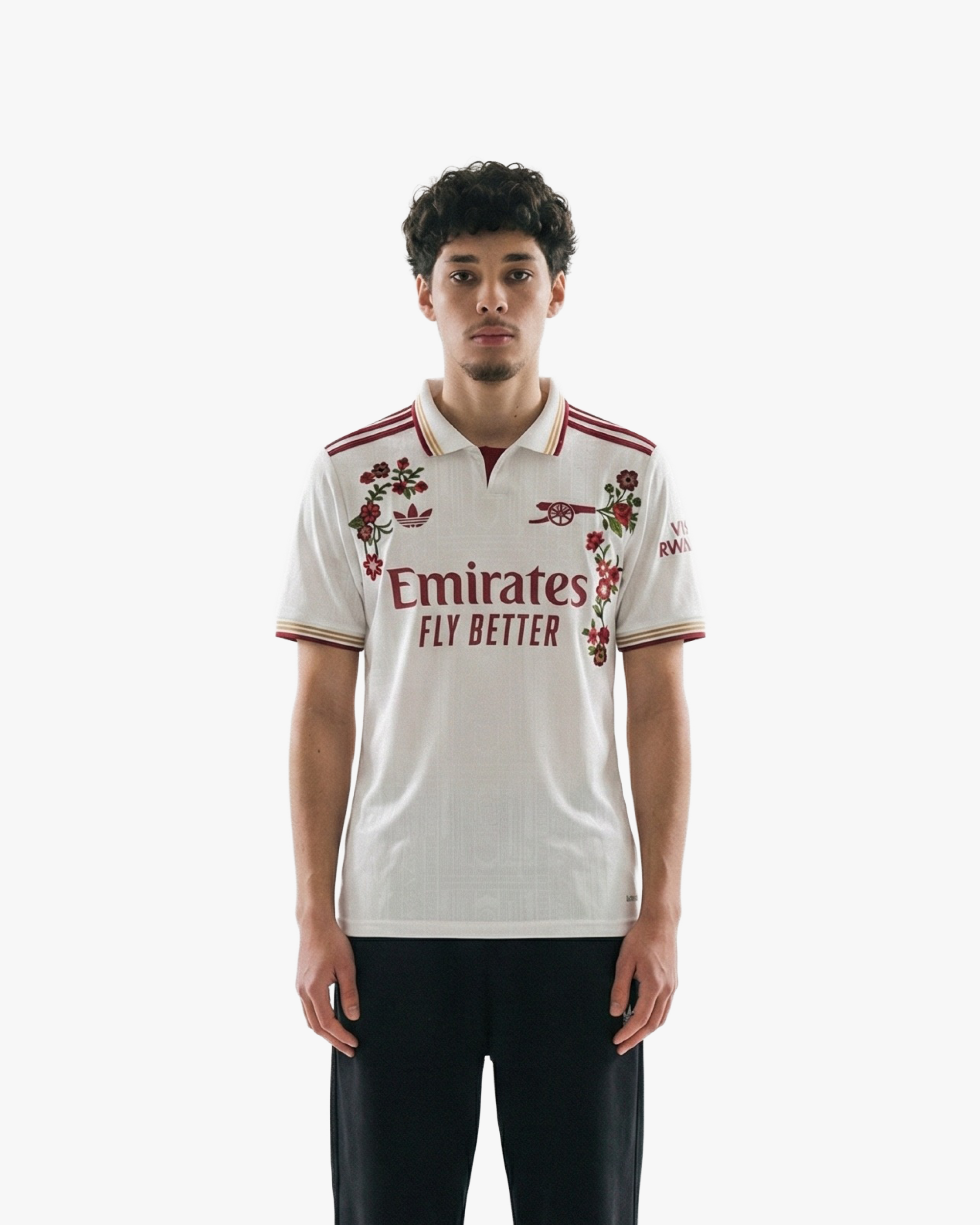 The Embroidered Arsenal Third Jersey 2025-26 on model, showcasing its modern athletic fit and striking red-on-white aesthetic.