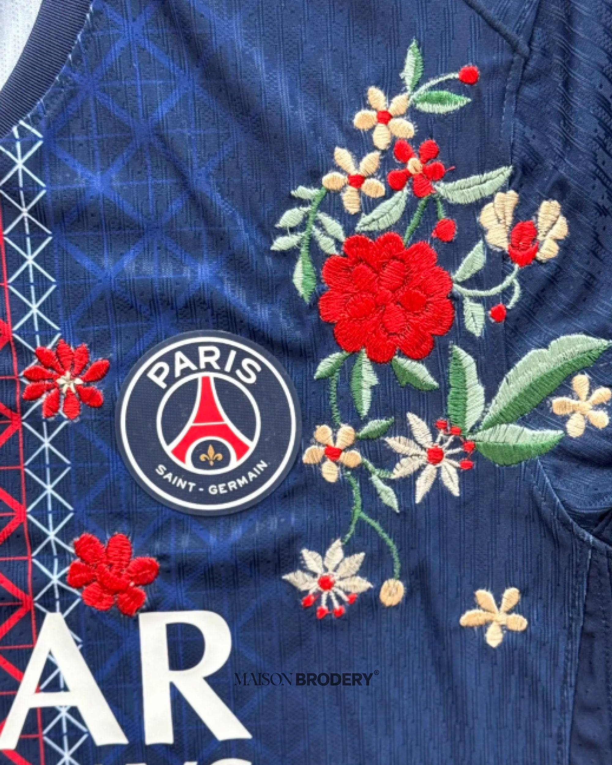 Embroidered PSG Home Jersey 2025-26 featuring luxurious floral embroidery and the Paris Saint-Germain logo.