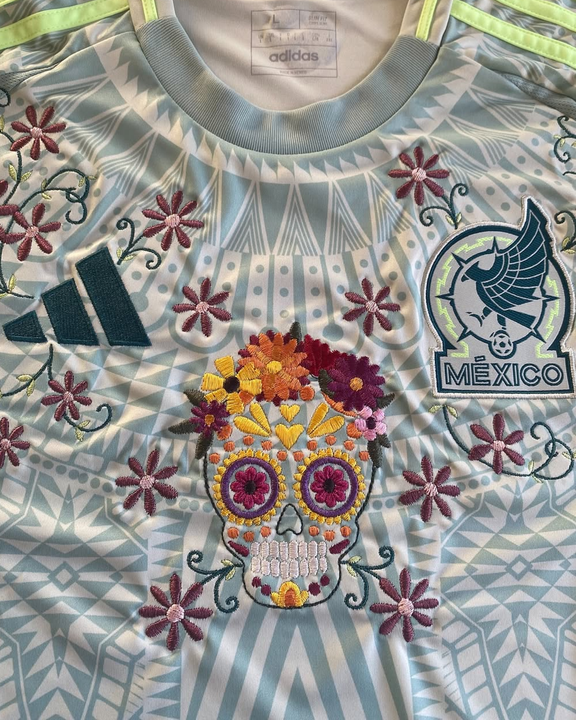 Detailed look at the high-quality floral craftsmanship on the Embroidered Mexico Away Jersey 2024-25, adding a unique artistic touch to the classic kit.