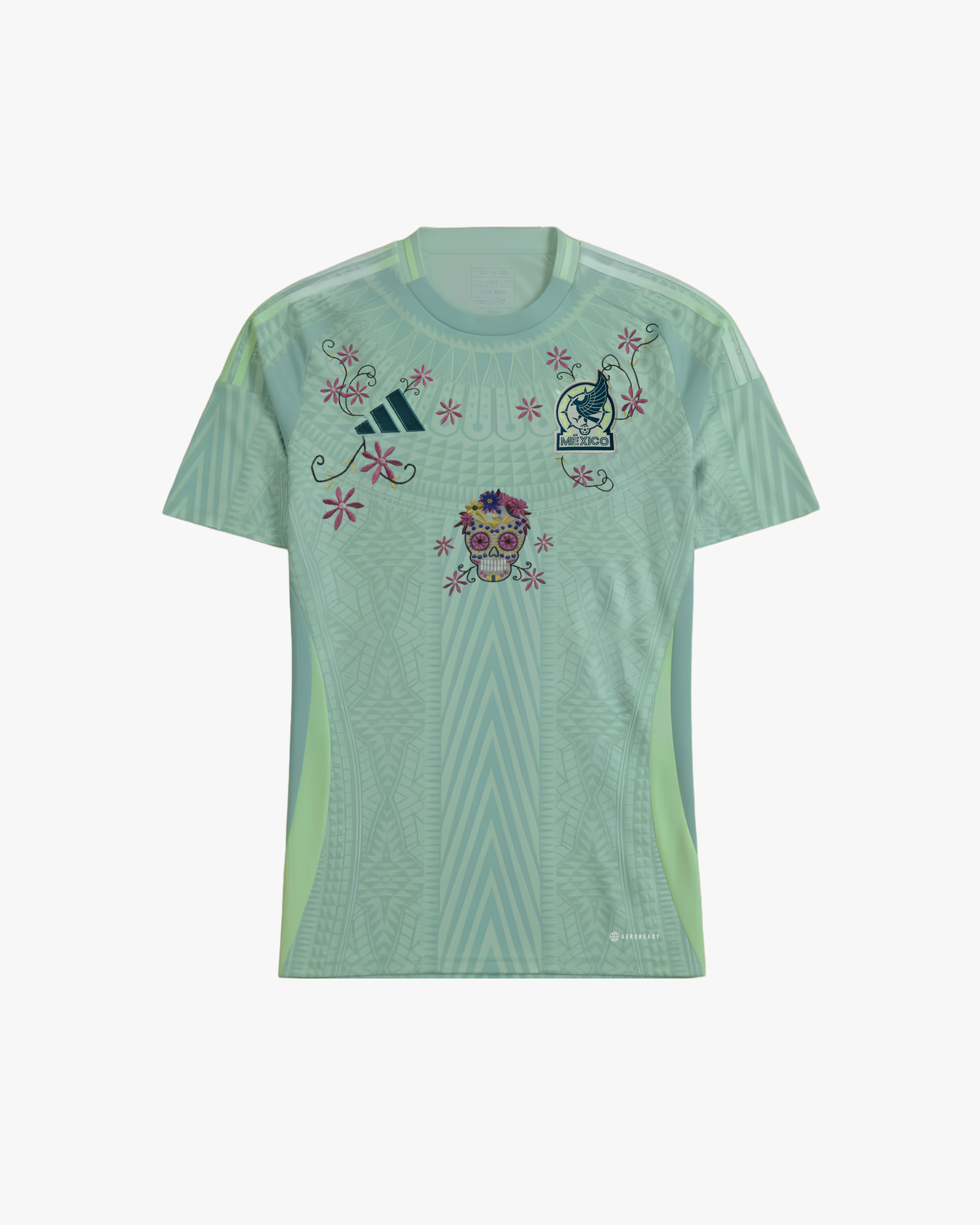 Full front view of the Embroidered Mexico Away Jersey 2024-25, featuring a light green base with intricate Aztec-inspired patterns and a central sugar skull embroidery.