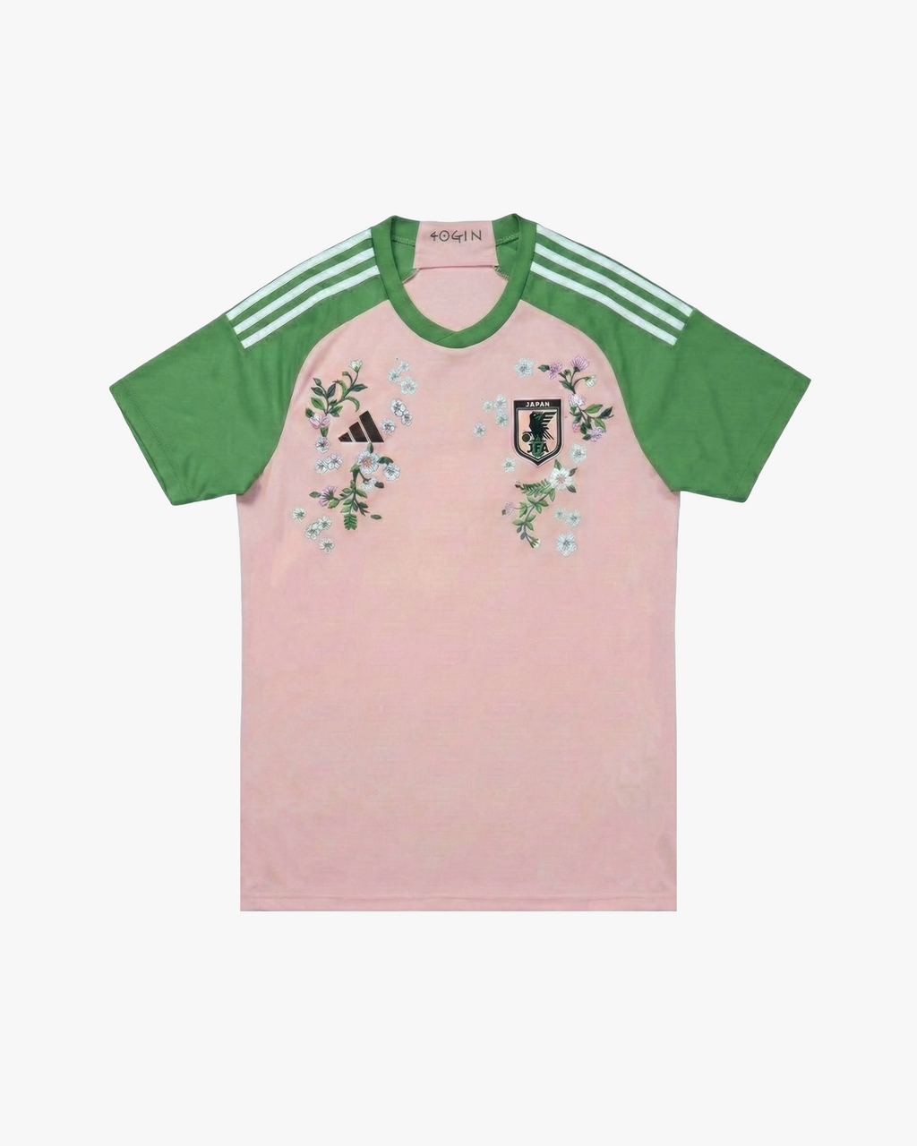 Full front view of the Embroidered Japan x Nigo 2022 jersey, featuring a unique pink and green cherry blossom-inspired design with premium embroidery.