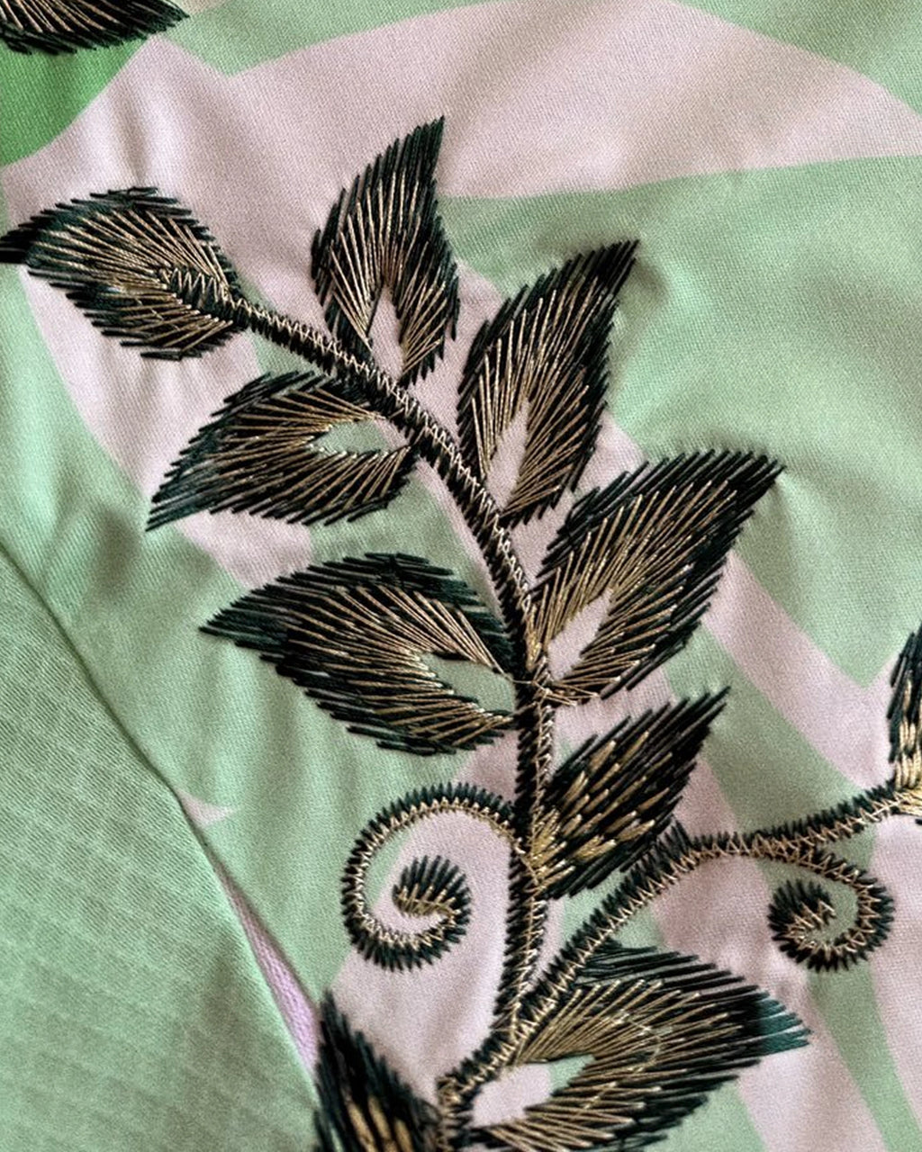 Close-Up Detail Of The High-Density Dark Green Leaf Embroidery On The Italy Embroidered Jersey