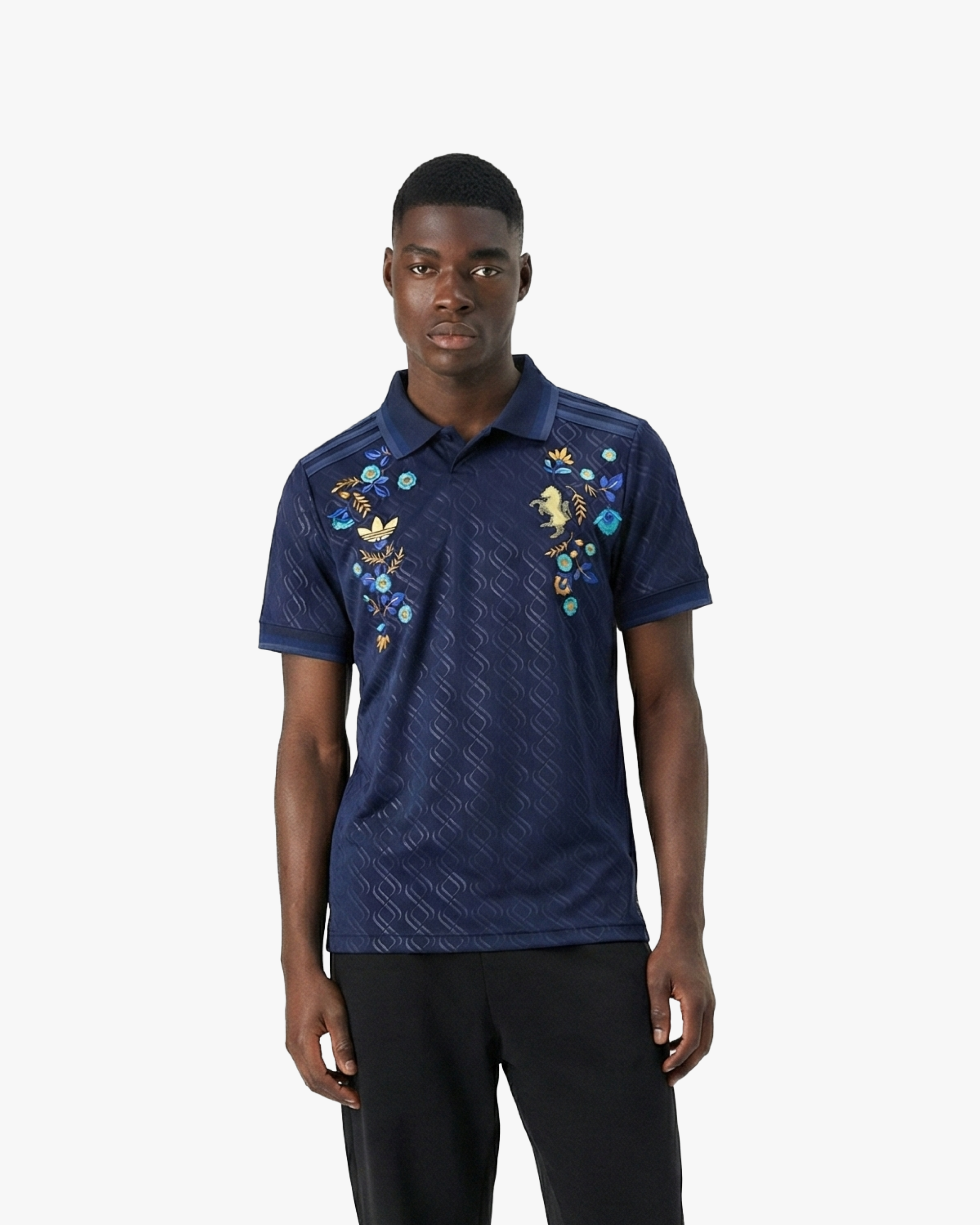 Embroidered Juventus Third Jersey 2024-25 worn by a model, featuring navy base and floral embroidery.