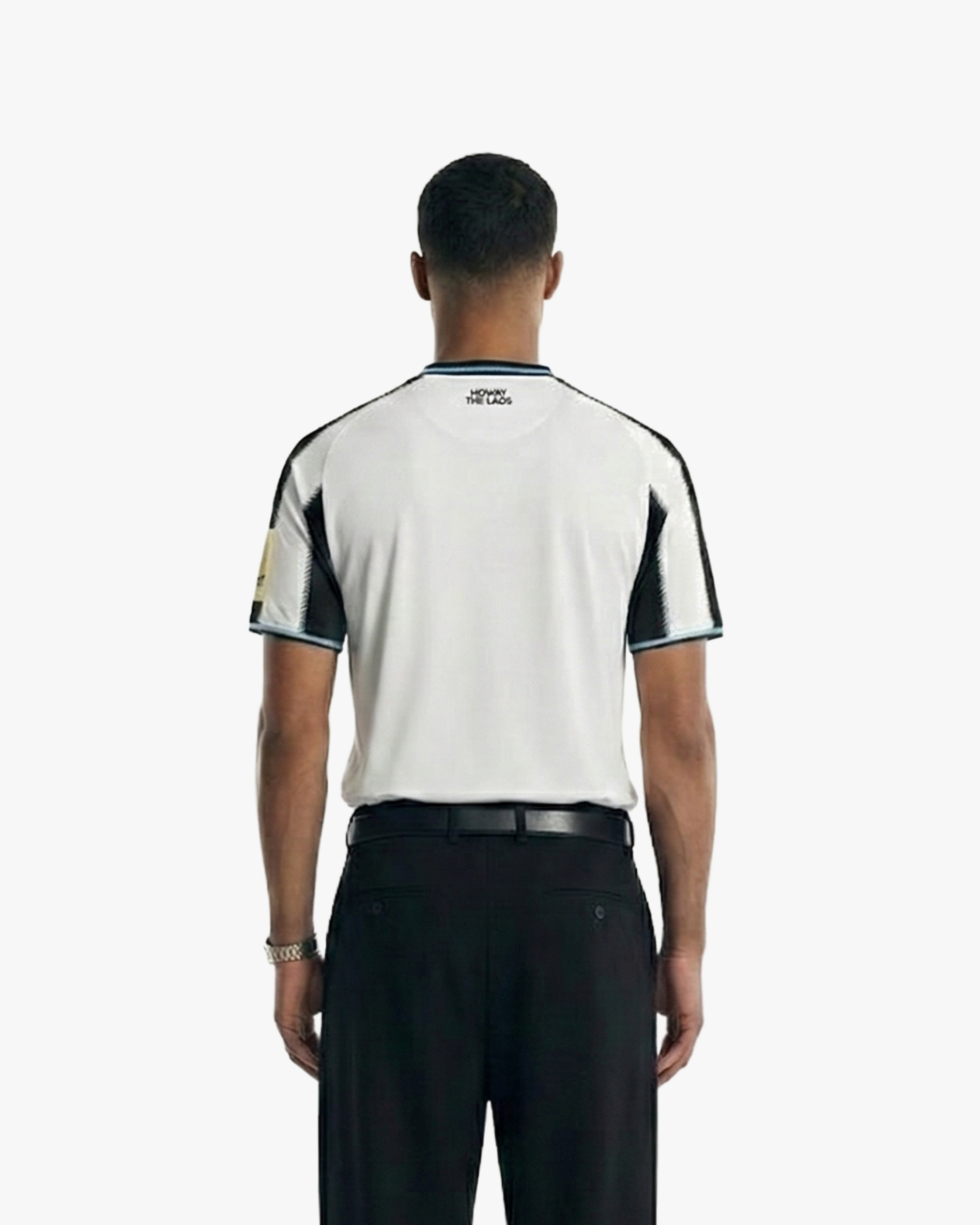 Back view of the Embroidered Newcastle Home Jersey 2025-26 on model, showcasing the sleek silhouette and professional finish.