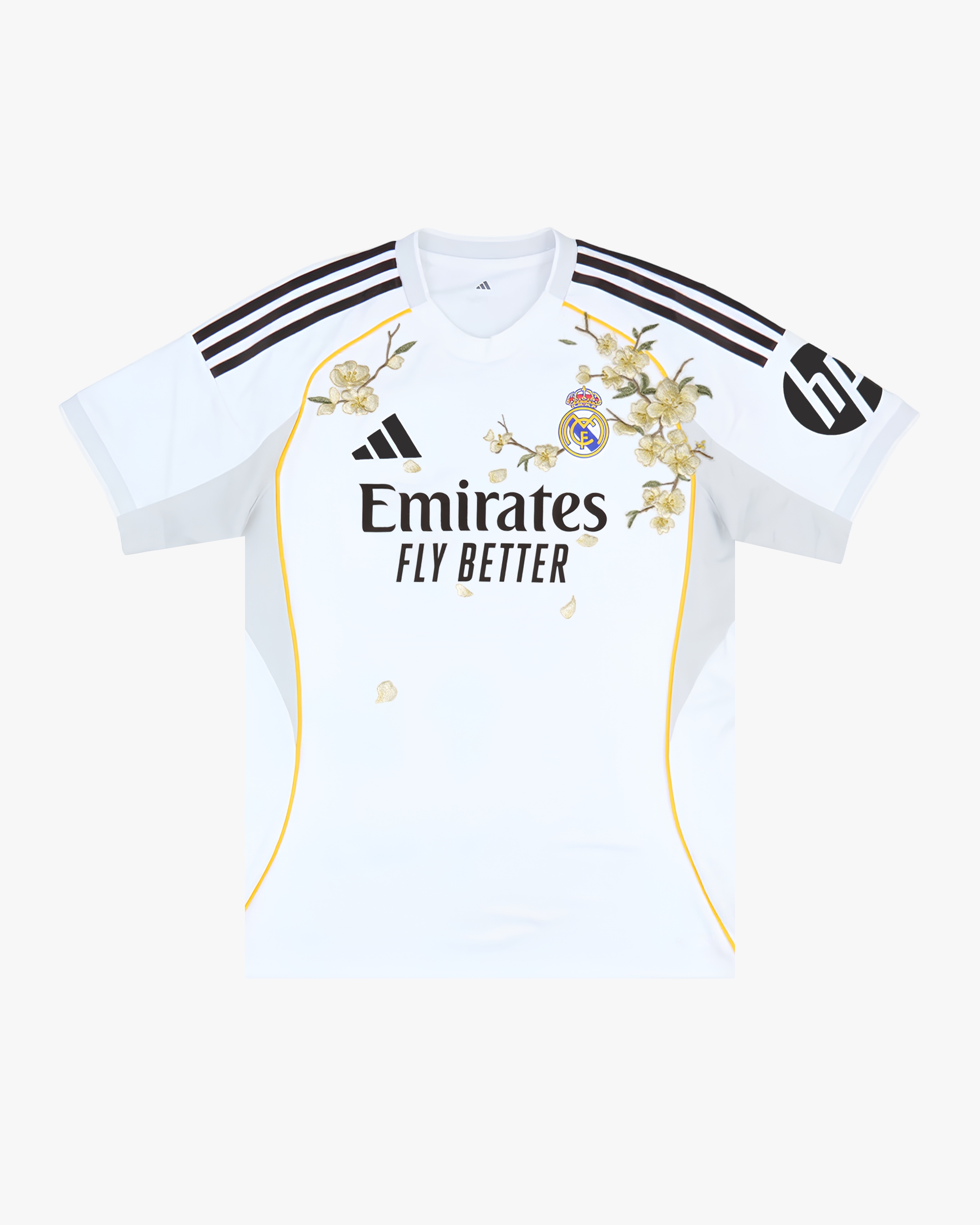 Full front view of the Real Madrid 'Golden Flowers' Edition 2025-26 Jersey featuring a pristine white base and intricate golden botanical stitching.