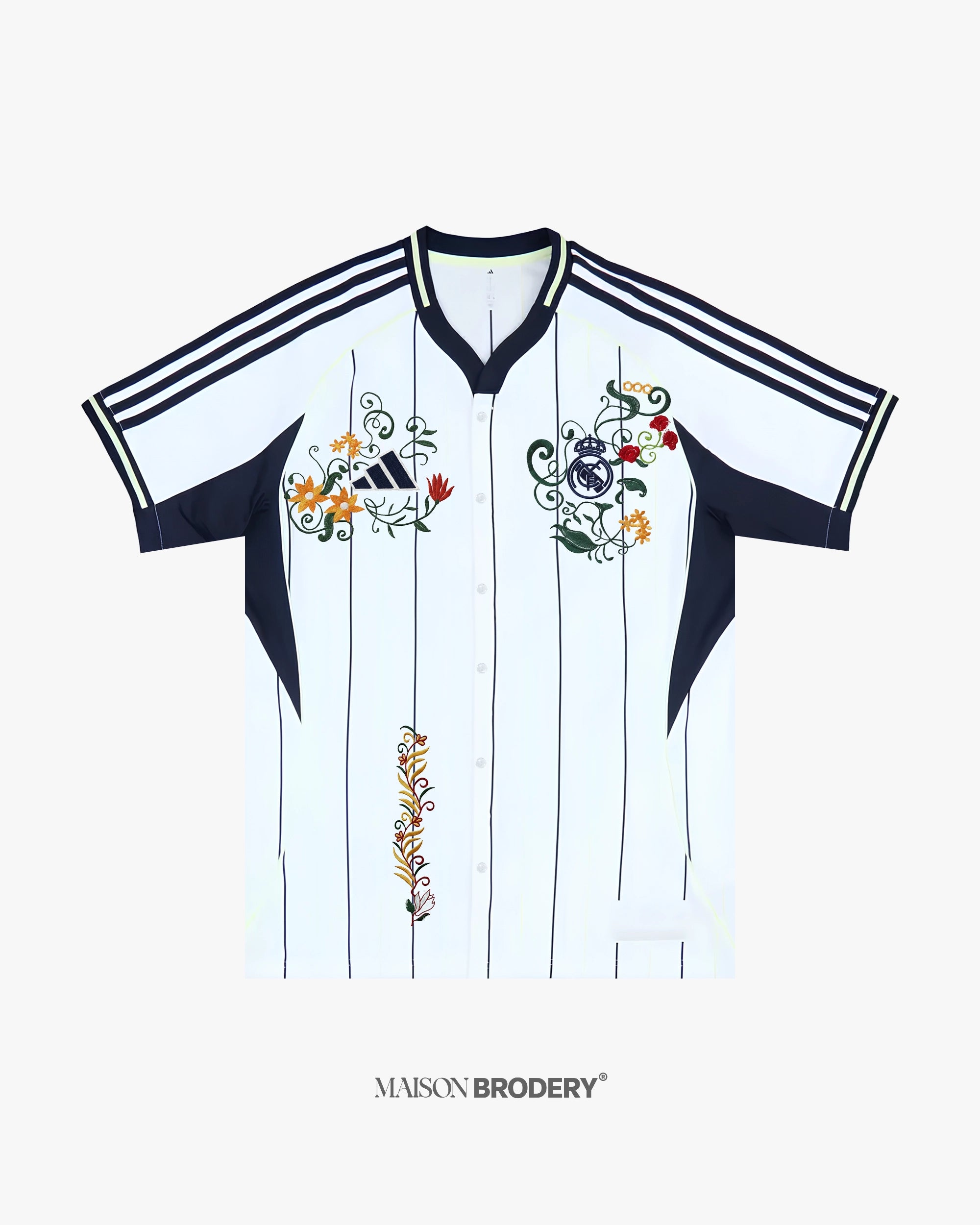 Embroidered Real Madrid US Pack front view showcasing floral stitching, pinstripes and button-down baseball silhouette.